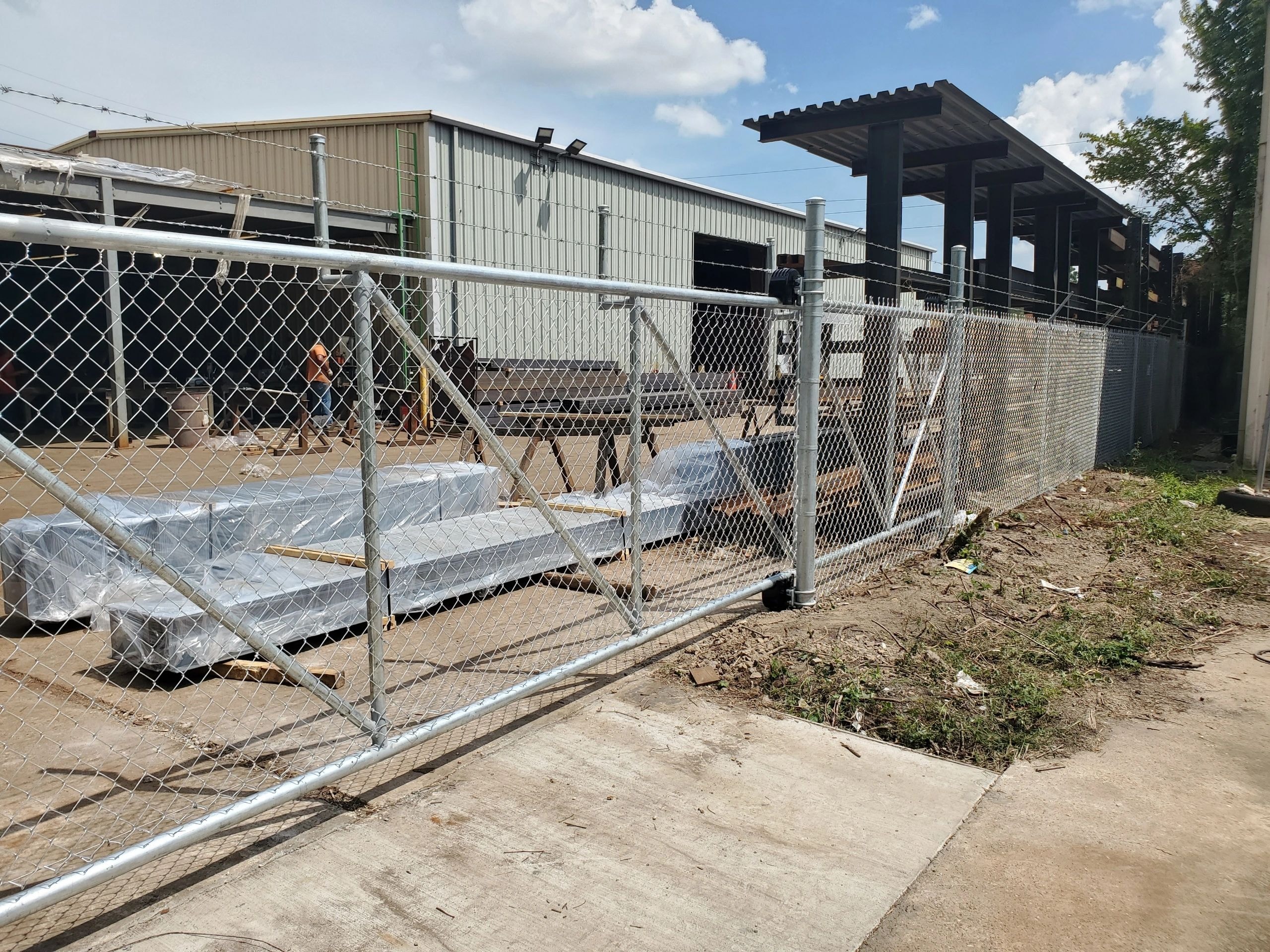 Chain link fence with gate installation Houston